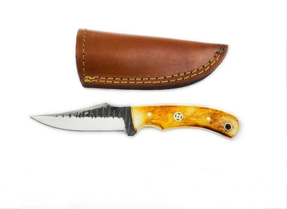 Carbon skinning knife TC-59 by Titan International K with amber handle and leather sheath on Tampa Home & Garden Store