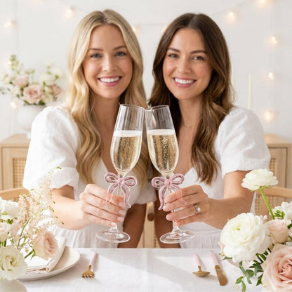Two Clear Champagne Glasses and a Pink Bow Set