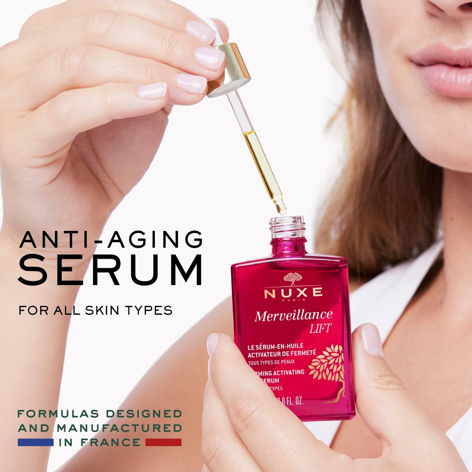 Merveillance Lift serum bottle with dropper in a red glass container, NUXE Paris anti-aging facial serum on Tampa Home & Garden Store