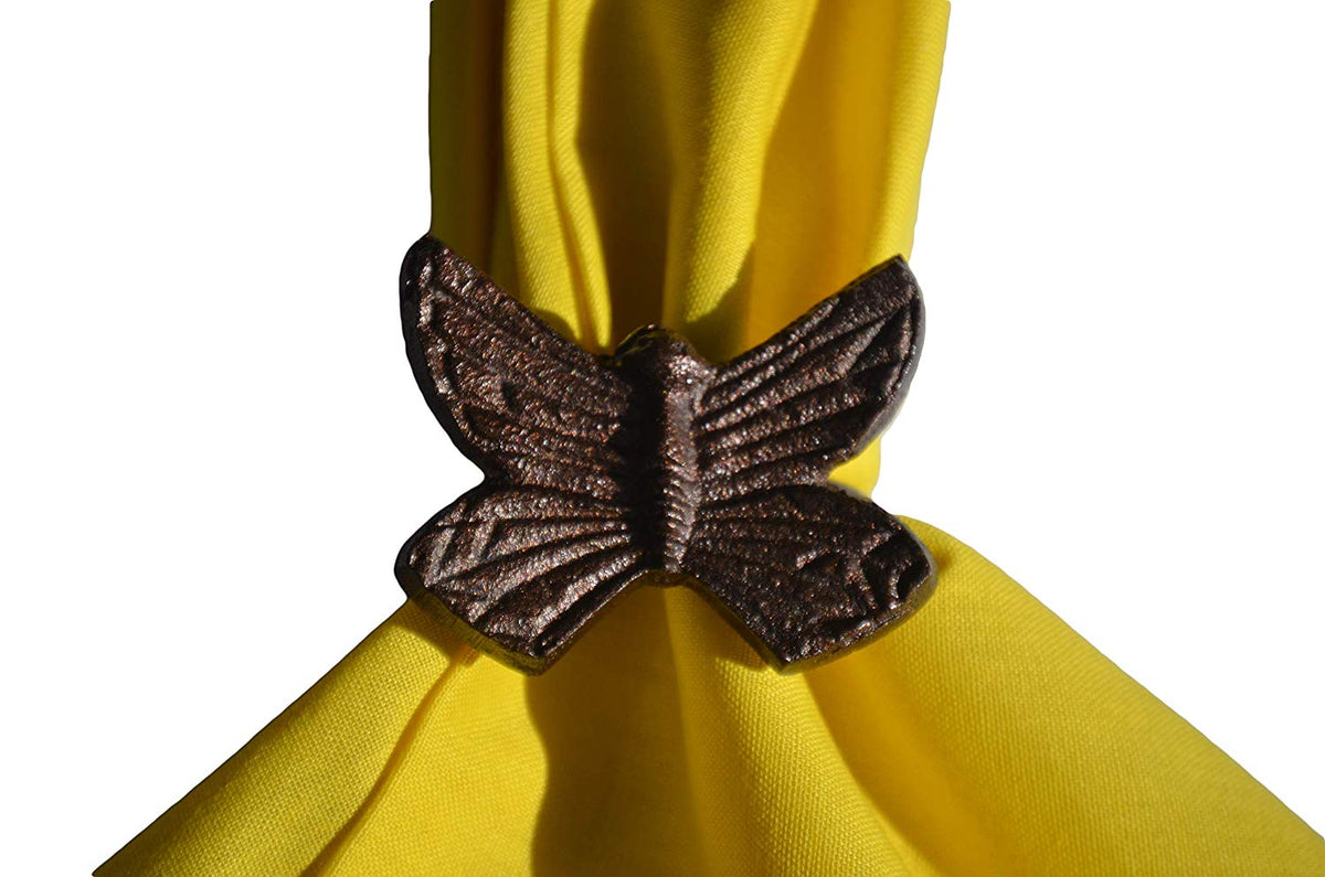 Vibhsa butterfly napkin ring aluminum, metallic bronze finish on yellow napkin on Tampa Home & Garden Store