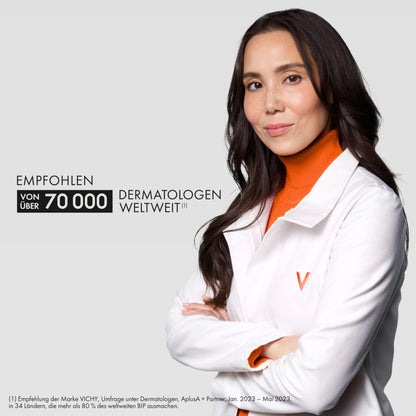 Skin care model in white lab coat with orange turtleneck against gray backdrop on Tampa Home & Garden Store