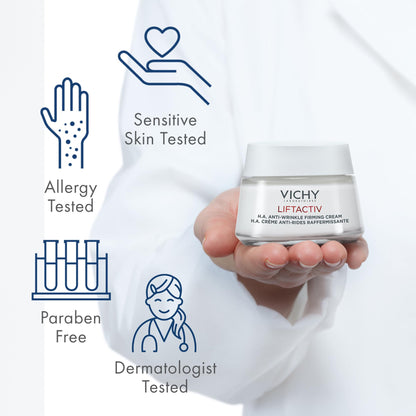 Vichy LIFTACTIV H.A. Anti-Wrinkle Firming Cream jar held in hand; white bottle, blue logo on Tampa Home & Garden Store