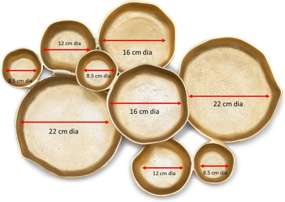 Cluster of Nine Decorative Gold Serving Bowls