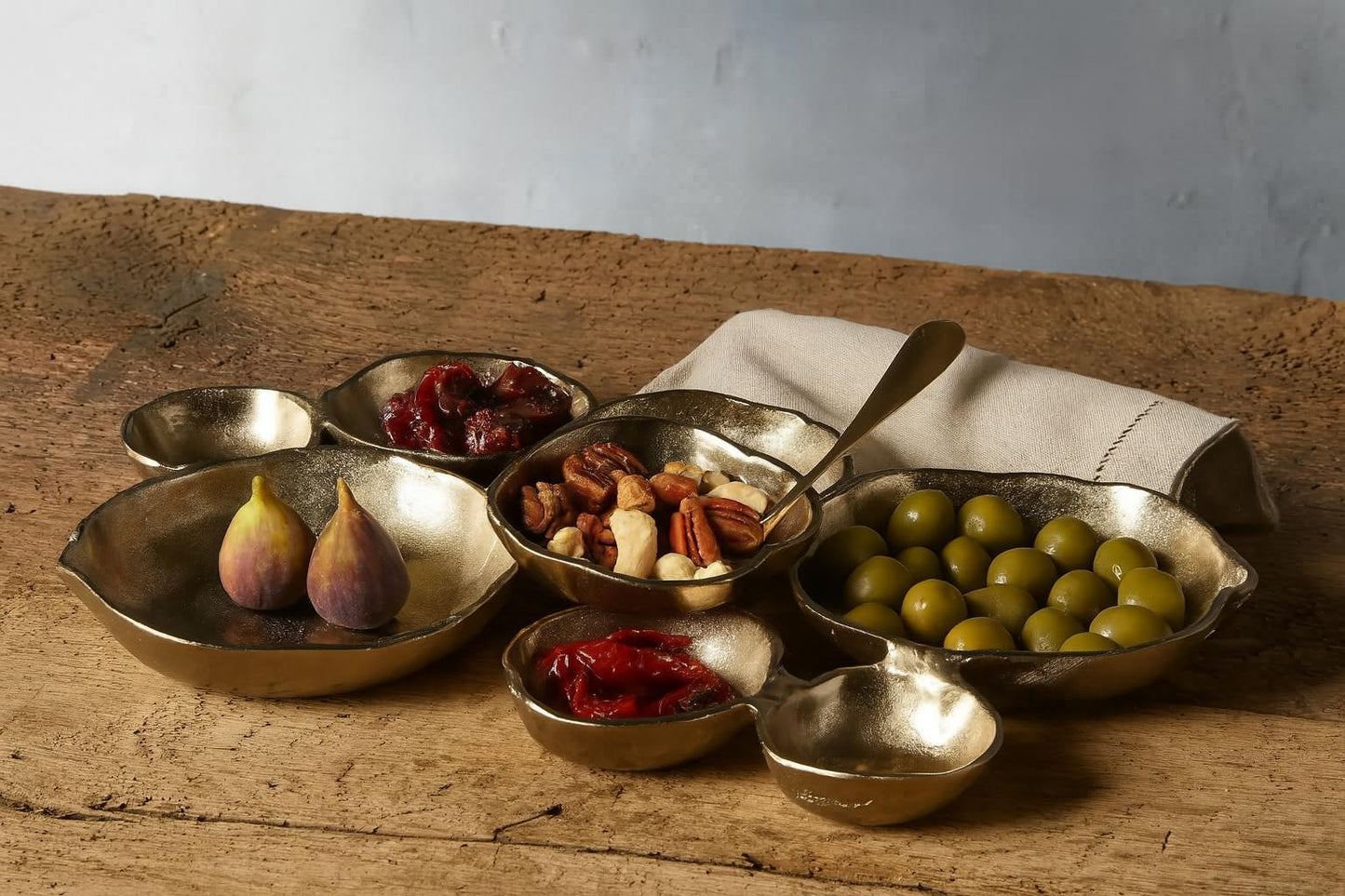 Cluster of Nine Decorative Gold Serving Bowls
