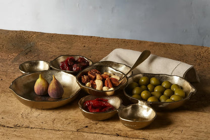 Cluster of Nine Decorative Gold Serving Bowls