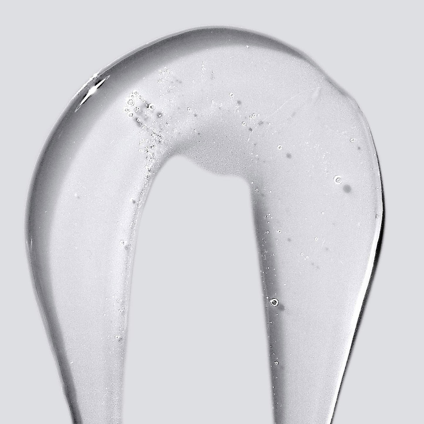 Dermalogica Conditioning Body Wash by Beauty Care Bag, foamy texture on curved white surface on Tampa Home & Garden Store