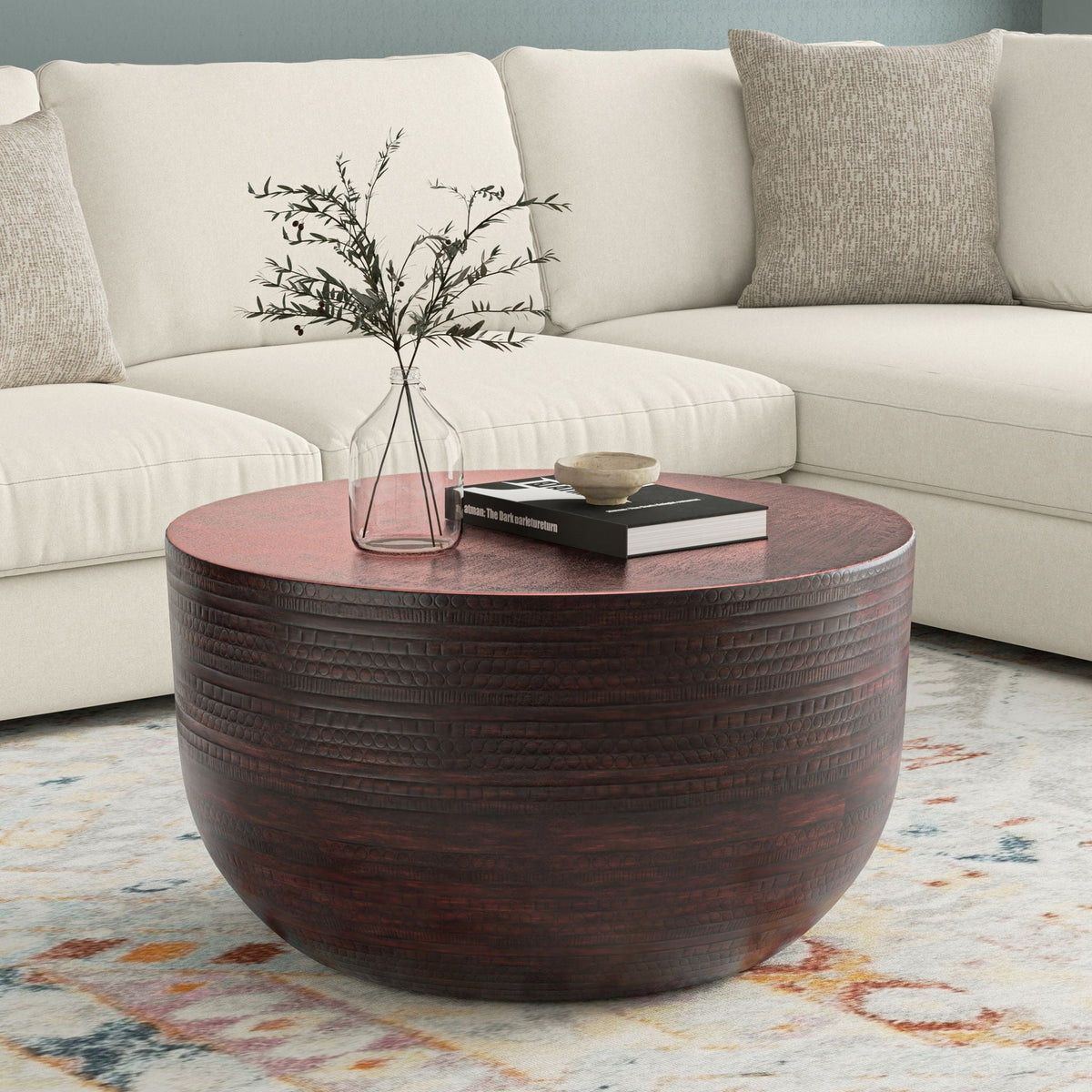 Handcrafted metal coffee table with textured circular ribbed detailing in dark brown on Tampa Home & Garden Store
