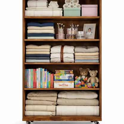Modern 5 Drawer Dresser With Wheels wooden accent chest with folded linens, towels, books on Tampa Home & Garden Store