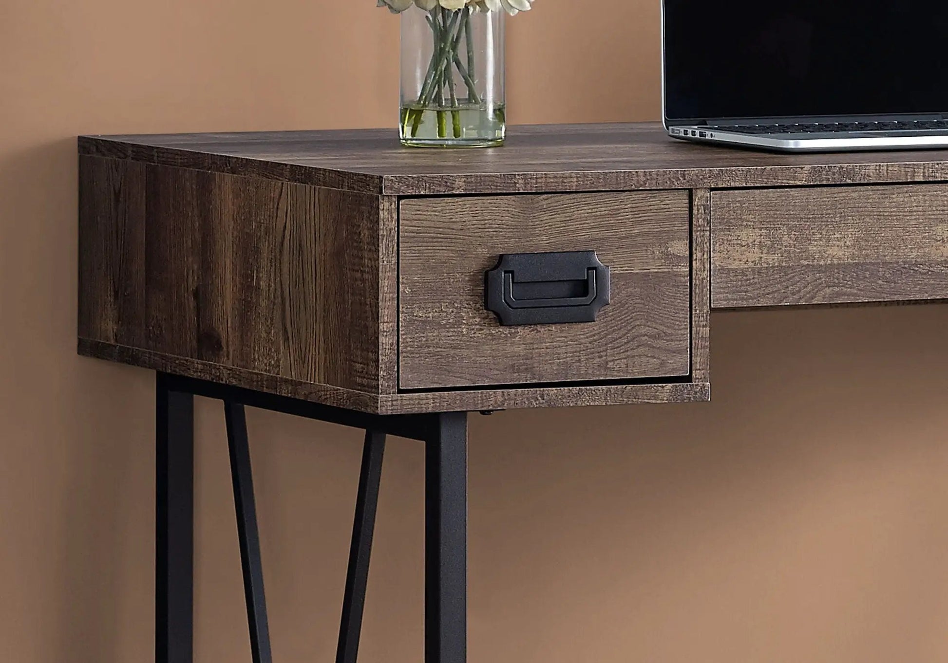 Writing desk in dark wood finish with storage drawer and black metal pull, laptop on top on Tampa Home & Garden Store