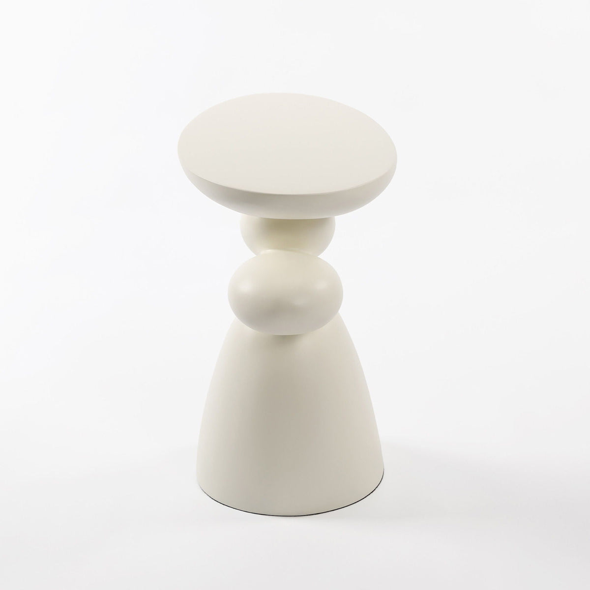 Lucky Stone Shaped End Table with Sculptural Base in cream finish on Tampa Home & Garden Store