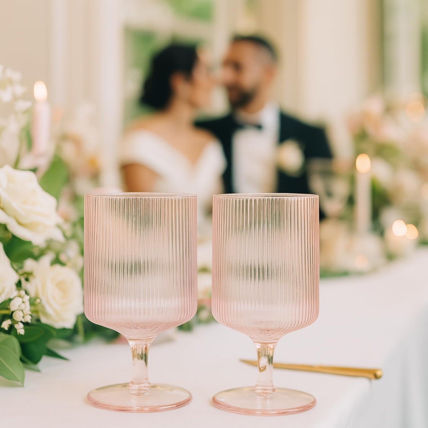 A Pair Of Blush Pink Ripple Stemmed Wine Glasses