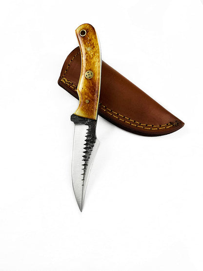 Titan Int'l K TC-59 carbon skinning knife with amber handle and brass pins leather sheath on Tampa Home & Garden Store
