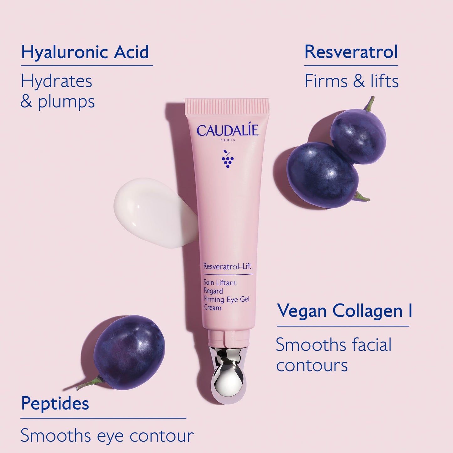 Caudalie Resveratrol Lift eye cream tube in pink with blue logo beside plums on Tampa Home & Garden Store
