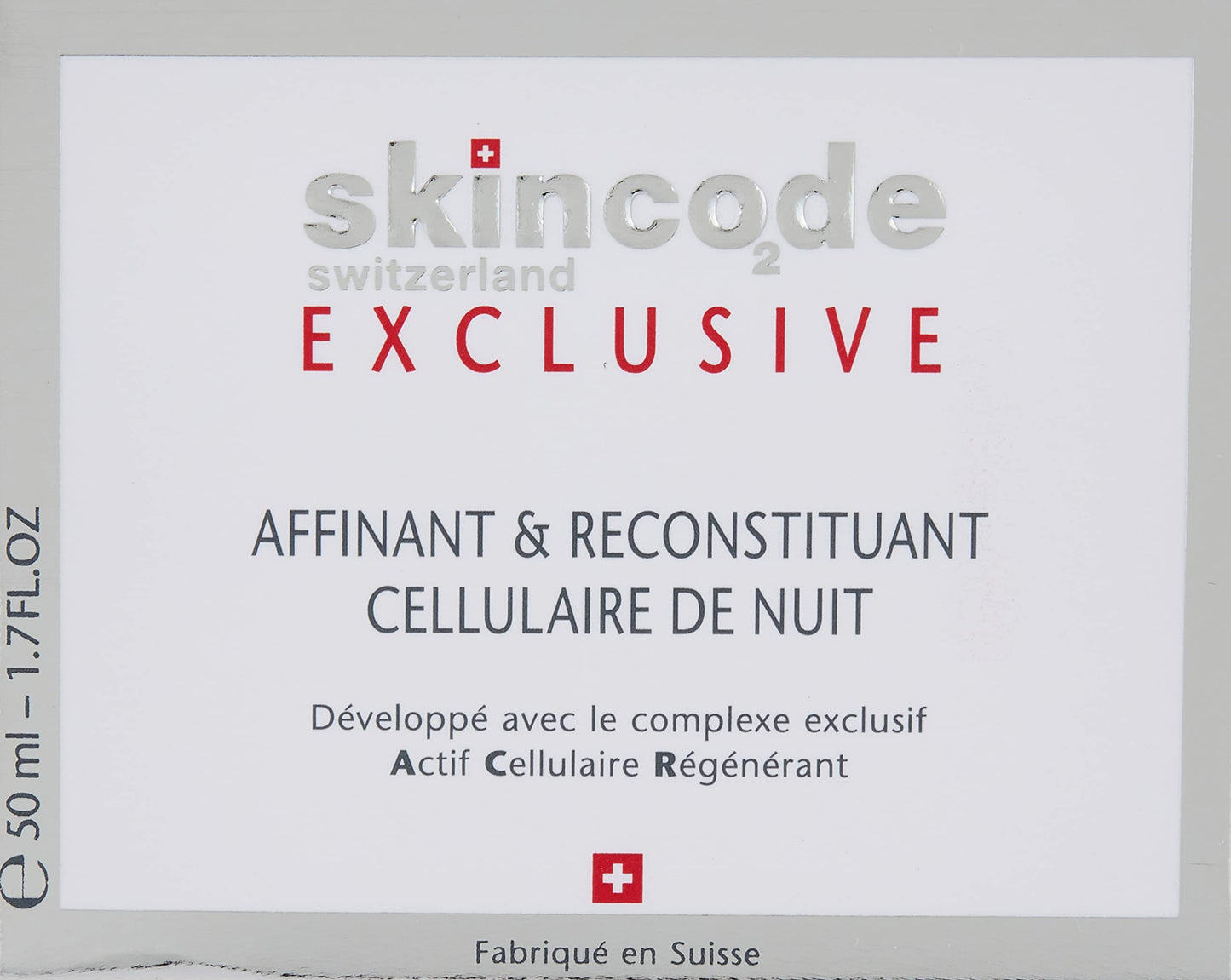Face cream box labeled SkinCode Switzerland Exclusive with silver logo and red cross on Tampa Home & Garden Store