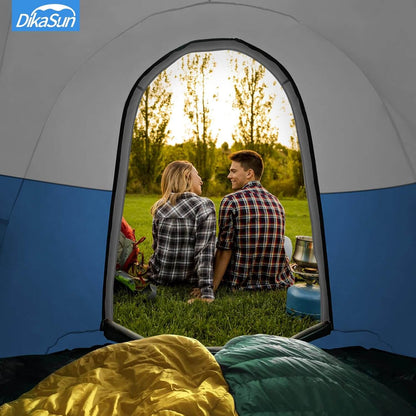 Truck bed tent with awning in blue by Dikasun Outdoor, 5.5-6.7ft, couple sits at doorway on Tampa Home & Garden Store