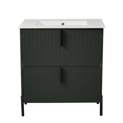 Bathroom vanity with ceramic sink and fluted dark green cabinet, white countertop on Tampa Home & Garden Store