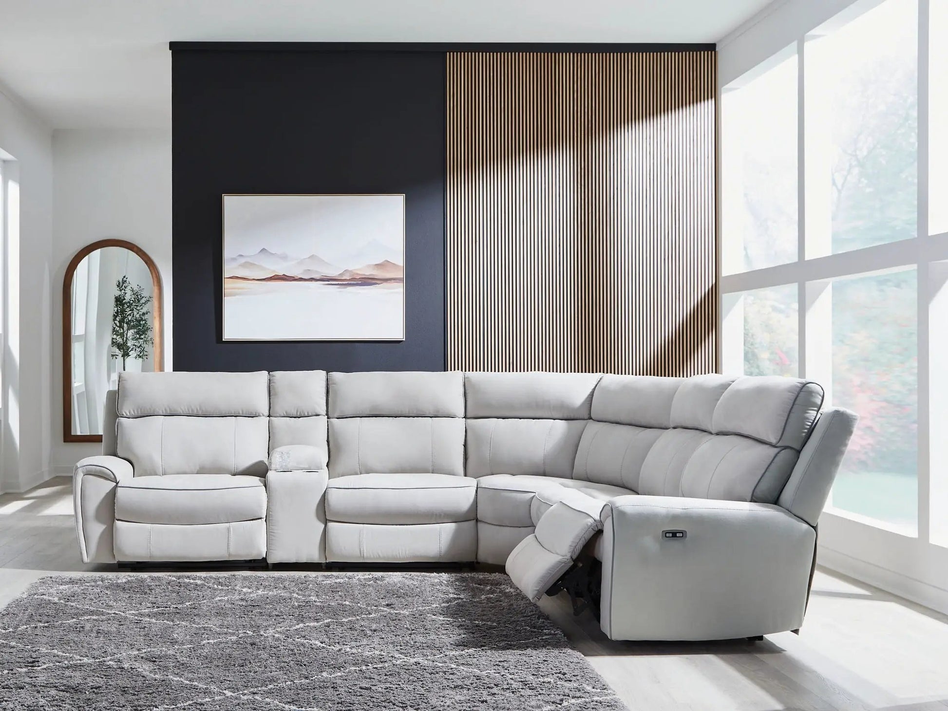 Social Pointe reclining sectional by Unique Piece Furniture in light gray upholstery on Tampa Home & Garden Store