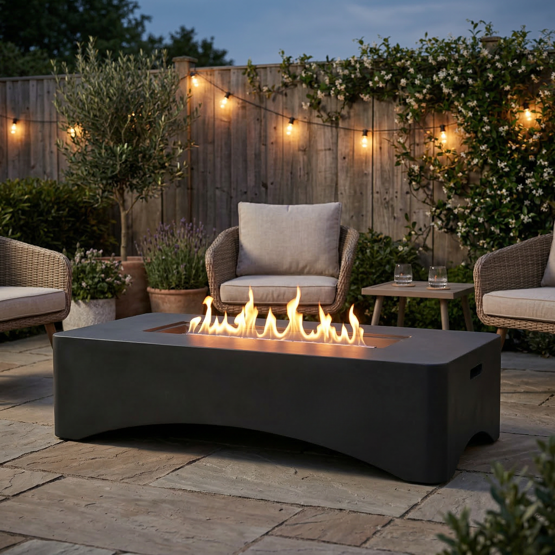 56in propane fire pit table, rectangular outdoor gas fire pit in black with flames on Tampa Home & Garden Store
