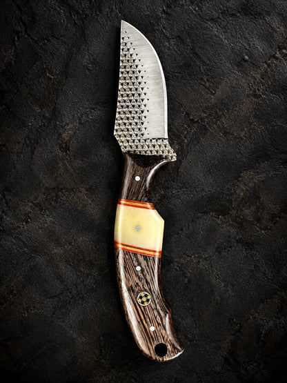 Titan Shadow Grain Skinner knife with high carbon RASP steel blade and striped wood handle on Tampa Home & Garden Store