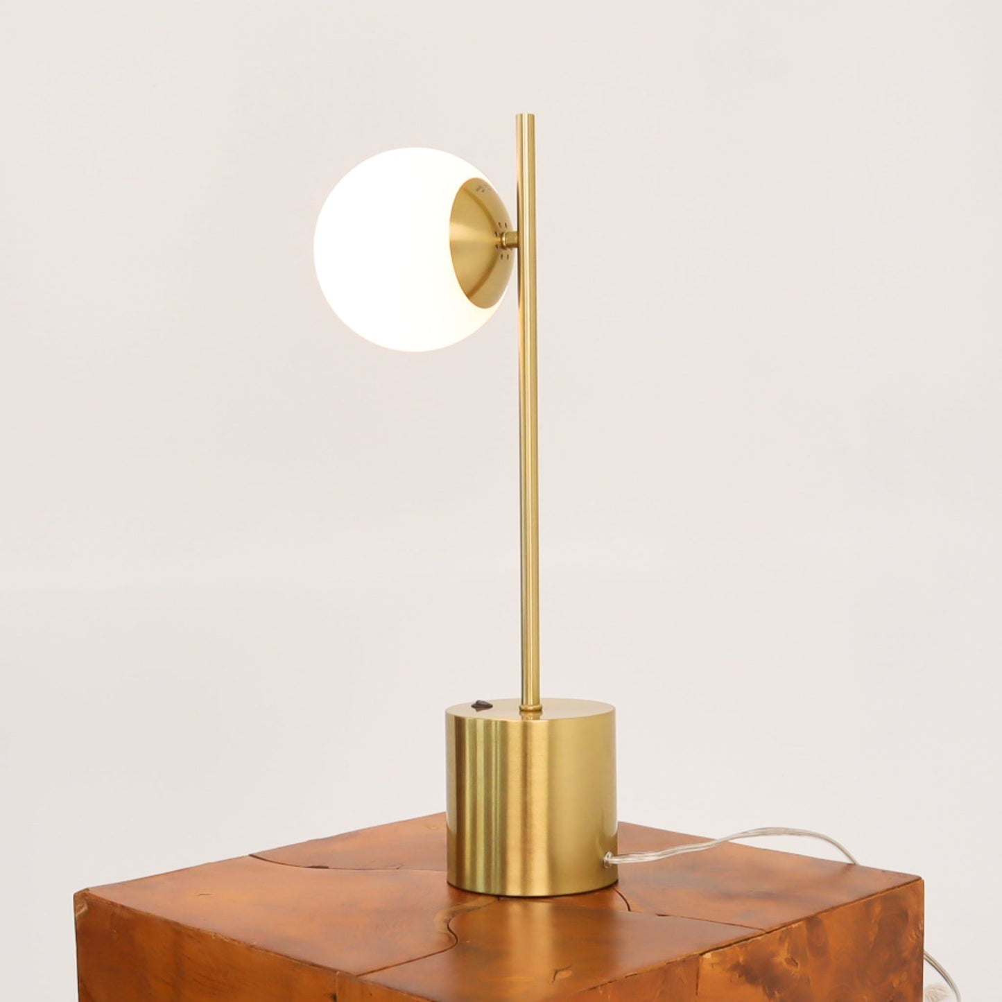HouseOfZazla Ethereal modern small table lamp with gold stem and white globe shade on Tampa Home & Garden Store