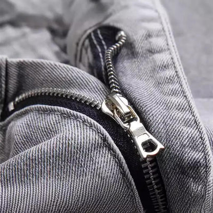 Men's gray denim jeans close-up featuring a metal zipper on Tampa Home & Garden Store