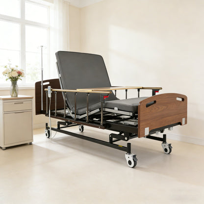 Electric hospital bed for home care by HouseOfZazla with gray mattress and wooden headboard on Tampa Home & Garden Store