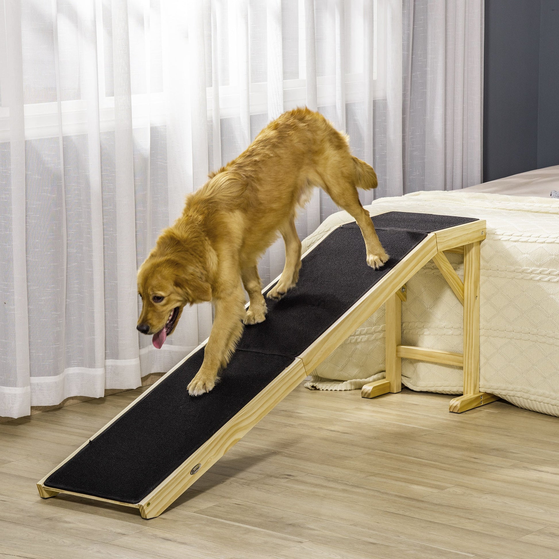 PawHut dog ramp for bed with non-slip carpet; wooden frame and black ramp surface in bedroom on Tampa Home & Garden Store