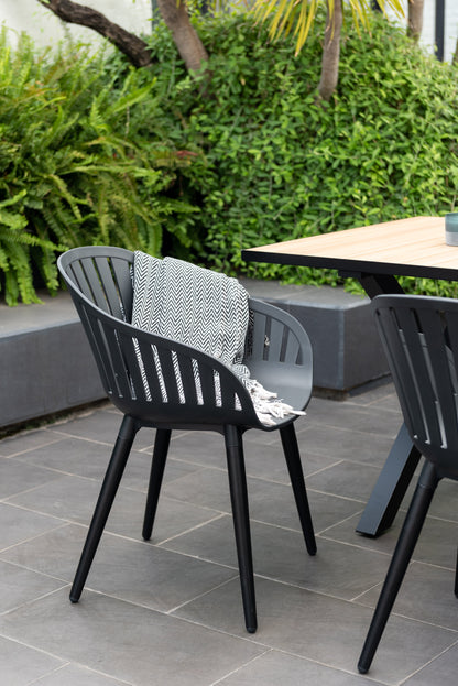 Panama dark rectangular dining table with 6 Nassau black aluminum chairs and cushions on Tampa Home & Garden Store