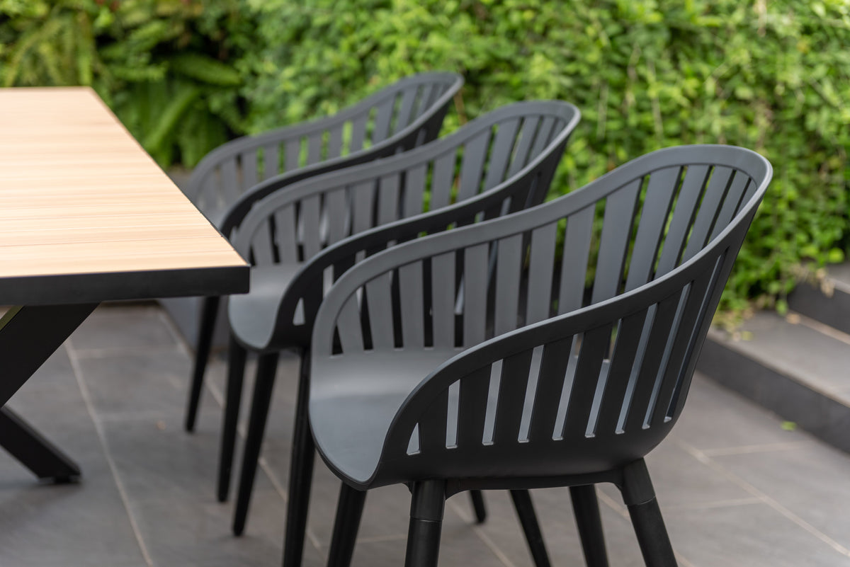 Panama Dark rectangular table with light wood top and six Nassau black aluminum chairs on Tampa Home & Garden Store