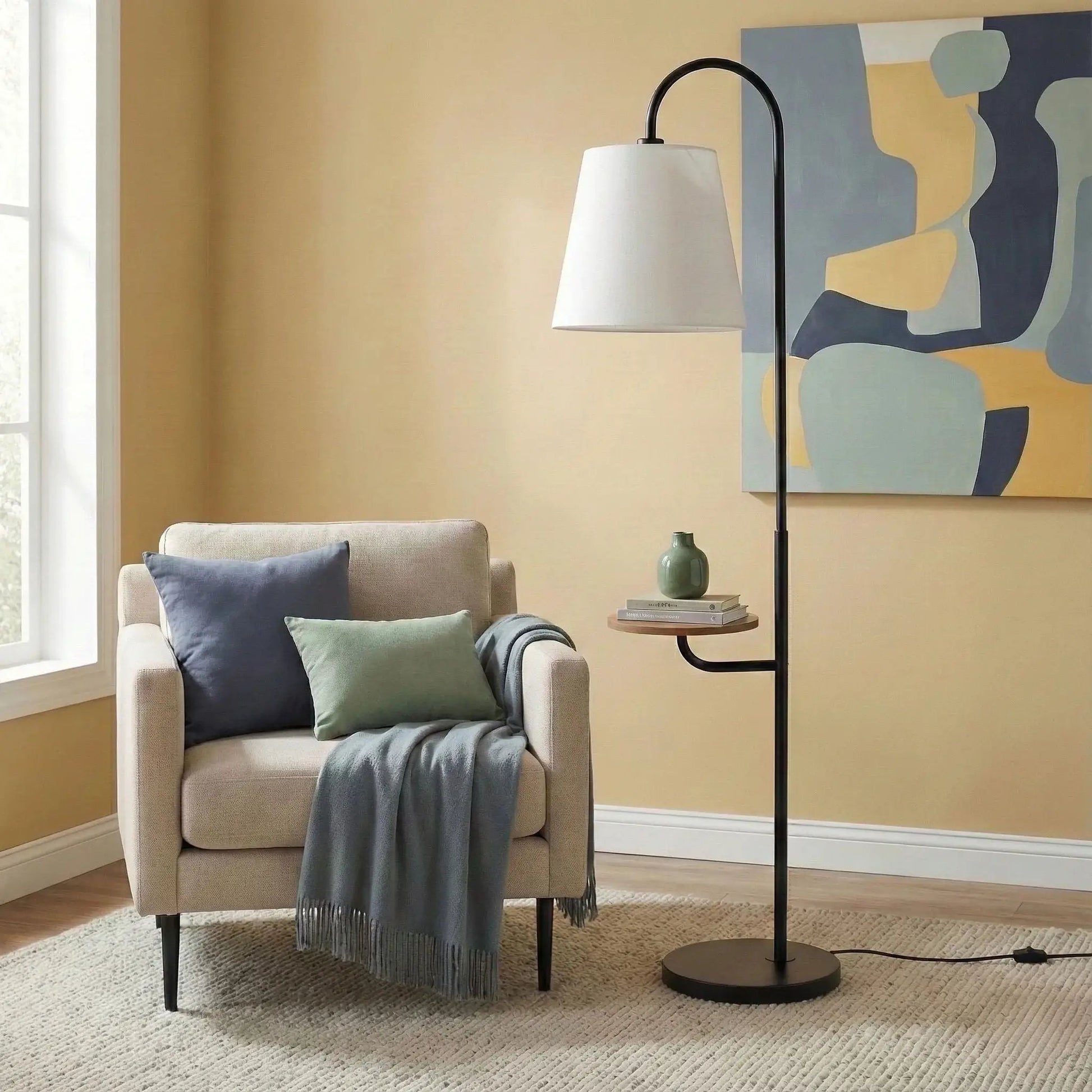 Seoul floor lamp with white fabric shade and black metal arc, round wood table base on Tampa Home & Garden Store