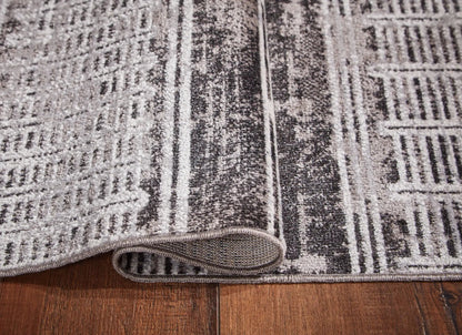 Henchester Rug with Geometric Distressed Pattern