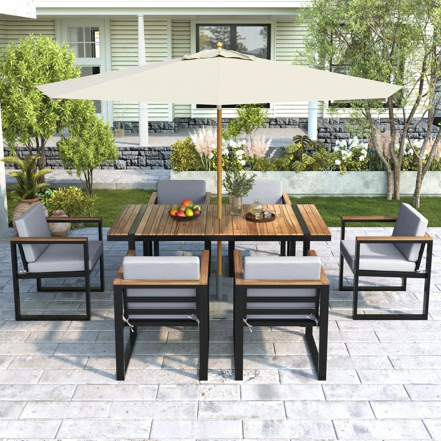 7-Piece outdoor dining set with table and removable gray cushions under beige umbrella on Tampa Home & Garden Store