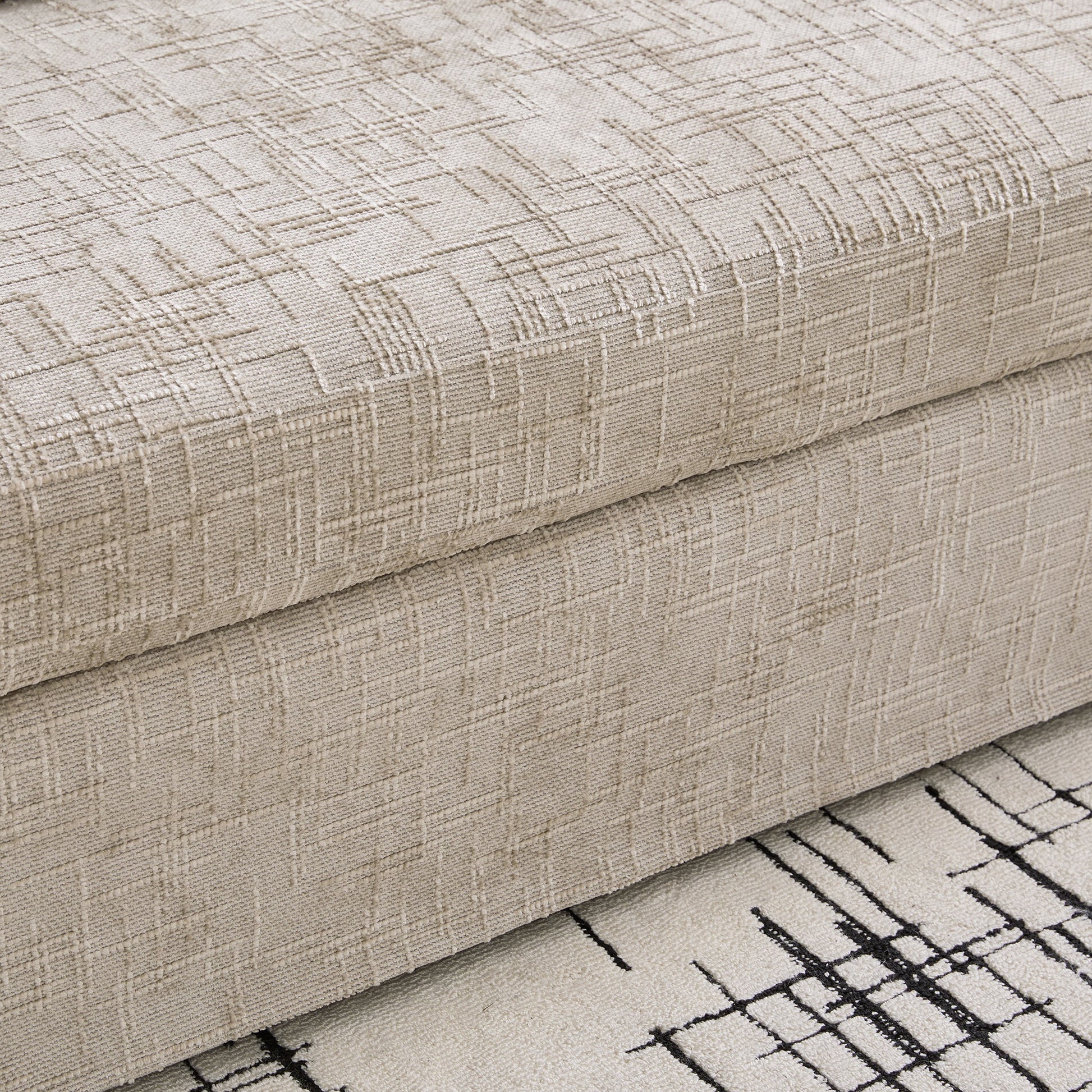 Wheat-toned sofa fabric close-up with geometric grid pattern by HouseOfZazla Sofas on Tampa Home & Garden Store