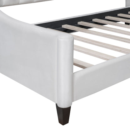 Modern tufted daybed in white faux leather with dark wood legs and slatted base on Tampa Home & Garden Store