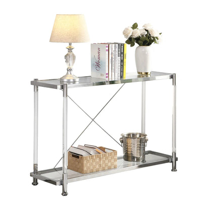 Chrome glass sofa table with two clear shelves and chrome frame, with lamp and white rose vase on Tampa Home & Garden Store