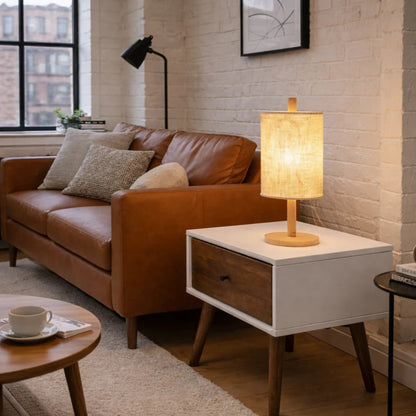 Modern Classic Desk Lamp with beige fabric shade and light wood base on white end table on Tampa Home & Garden Store