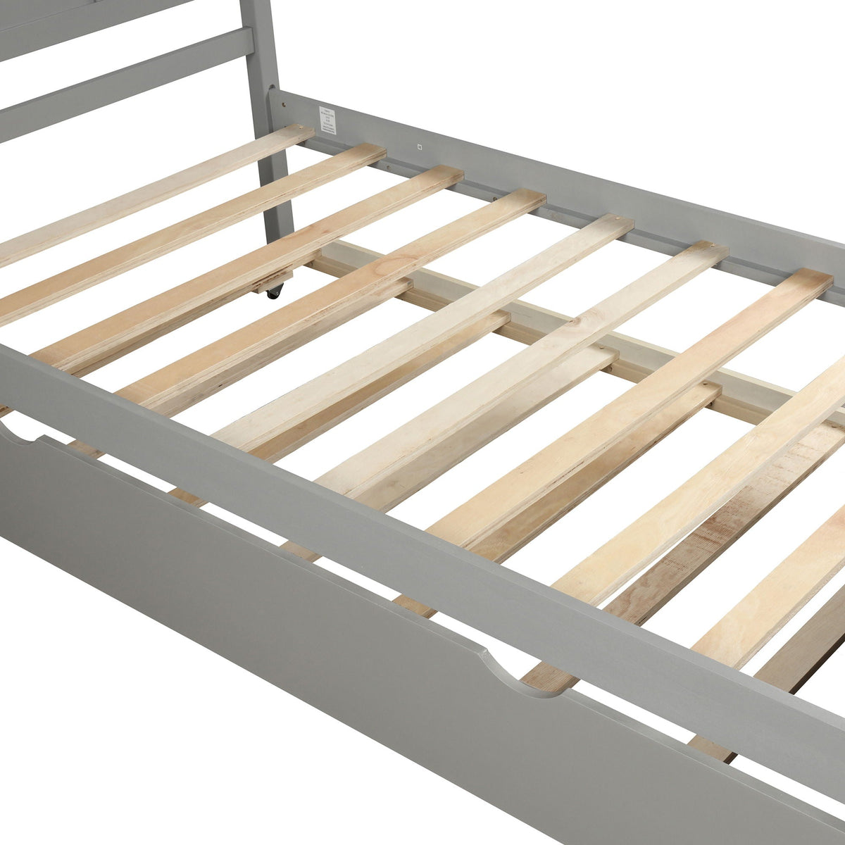 Platform bed frame in gray with twin-size trundle and exposed wooden slat base on Tampa Home & Garden Store