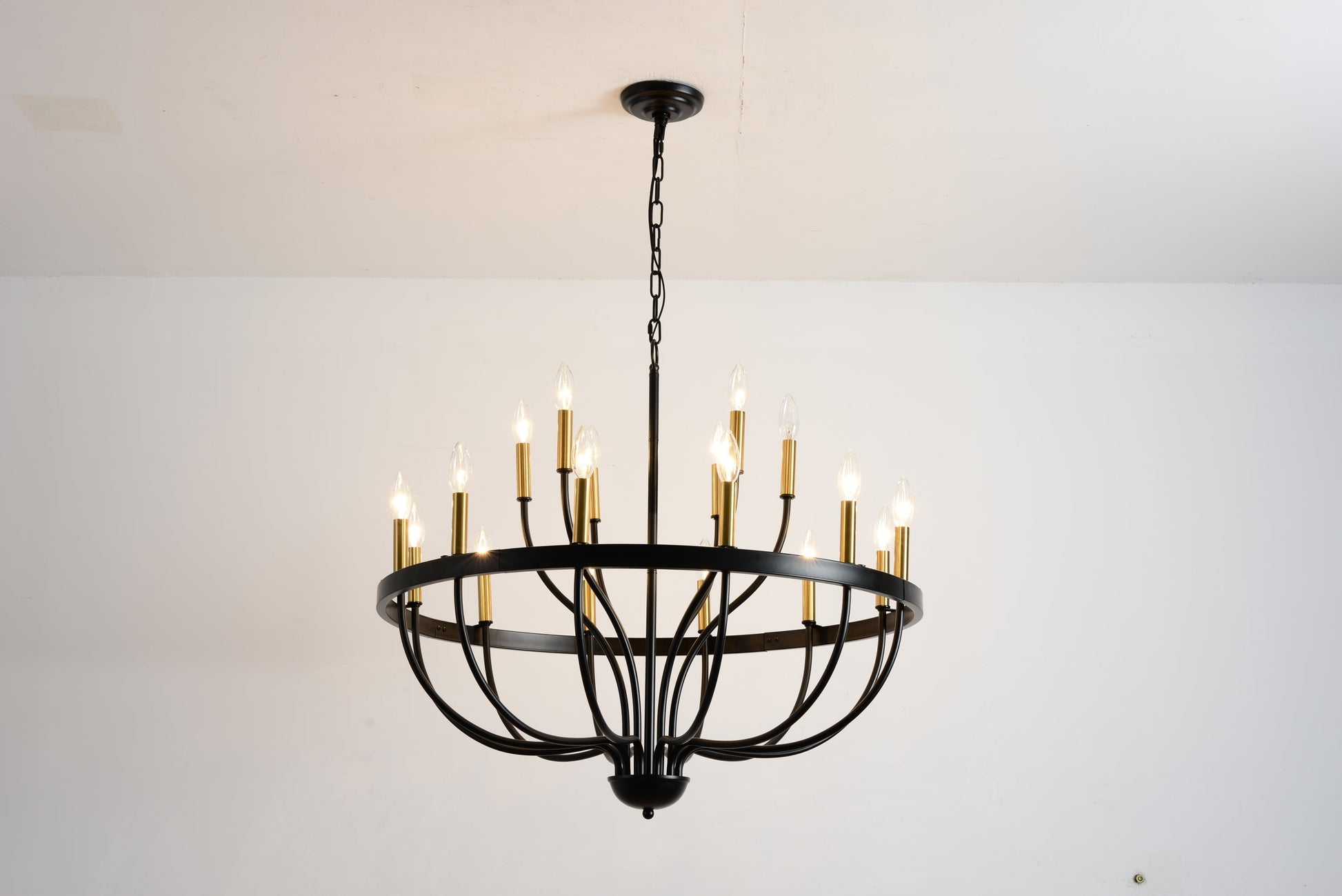 15-light industrial iron candle chandelier with black circular frame and gold candle sleeves on Tampa Home & Garden Store