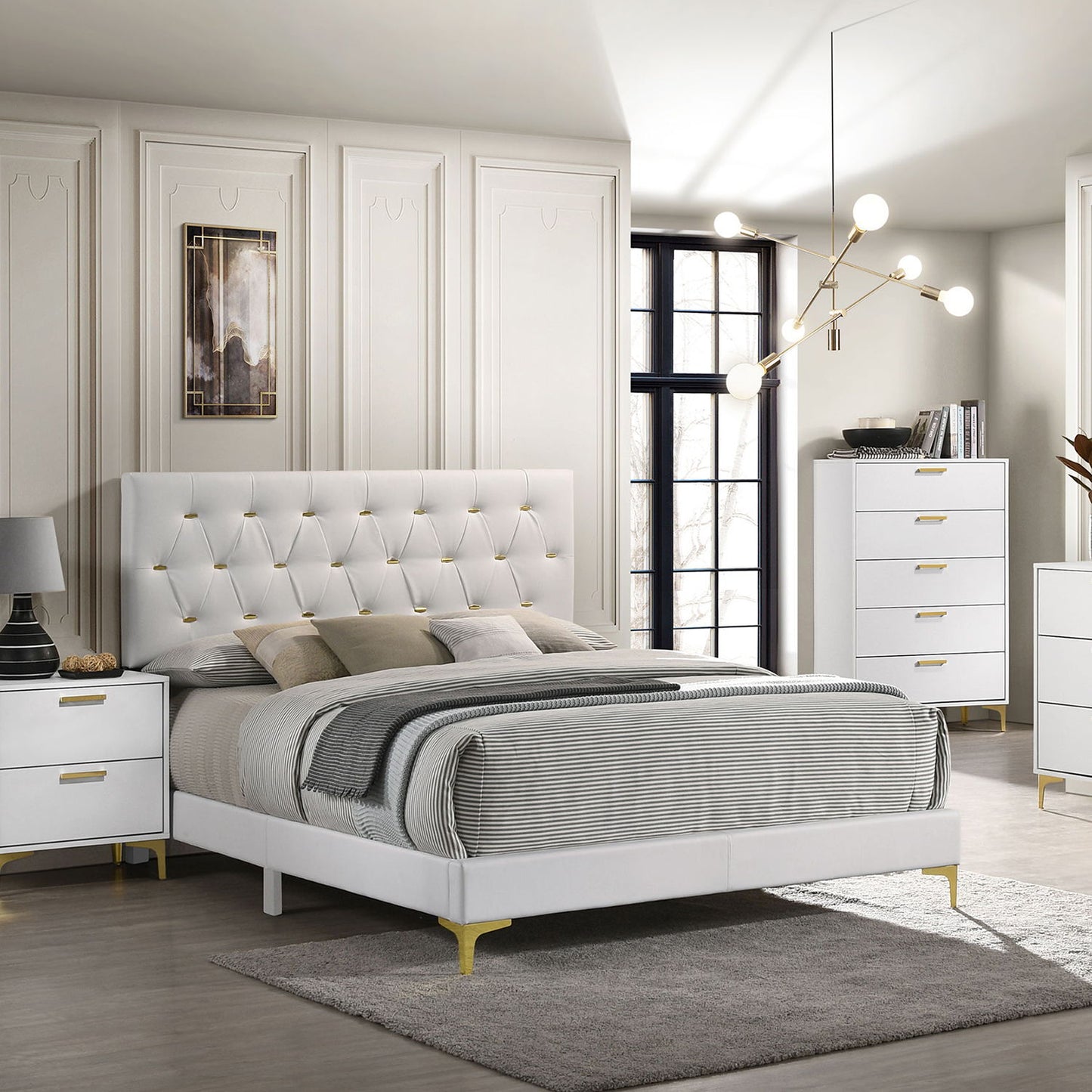 James - Panel Bed, white upholstered bed with tufted headboard and gold legs in a modern bedroom on Tampa Home & Garden Store