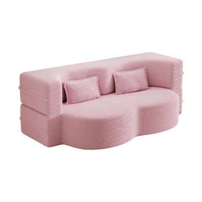 Modern floor futon sofa in pink teddy fabric with two pillows on Tampa Home & Garden Store