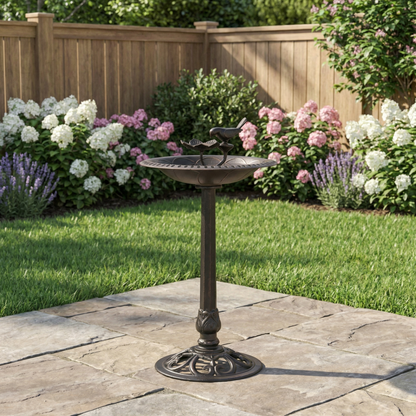 Outdoor aluminum and iron bird bath with decorative birds atop a dark metal basin and ornate pedestal in a garden on Tampa Home & Garden Store
