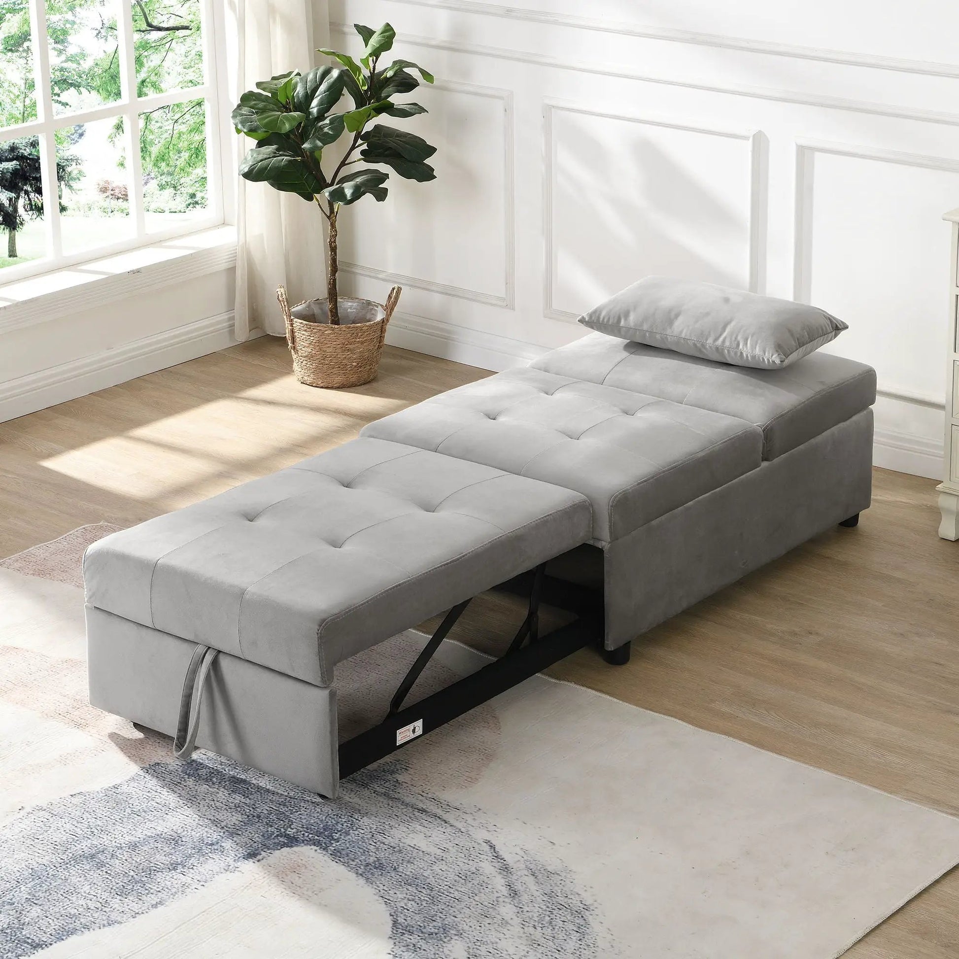 Folding Ottoman Sofa Bed gray fabric sleeper chair with tufted cushions in bright room on Tampa Home & Garden Store