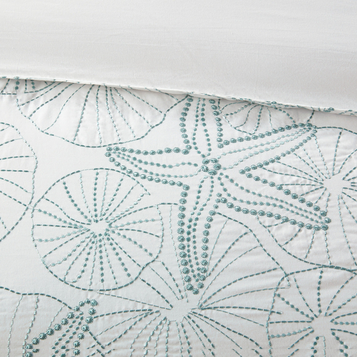 Comforter Set White King by HouseOfZazla with teal embroidered sea-star motif on white quilted fabric on Tampa Home & Garden Store