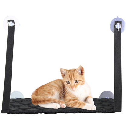 Cat hammock window perch on black quilted mat with suction straps, orange tabby cat on Tampa Home & Garden Store