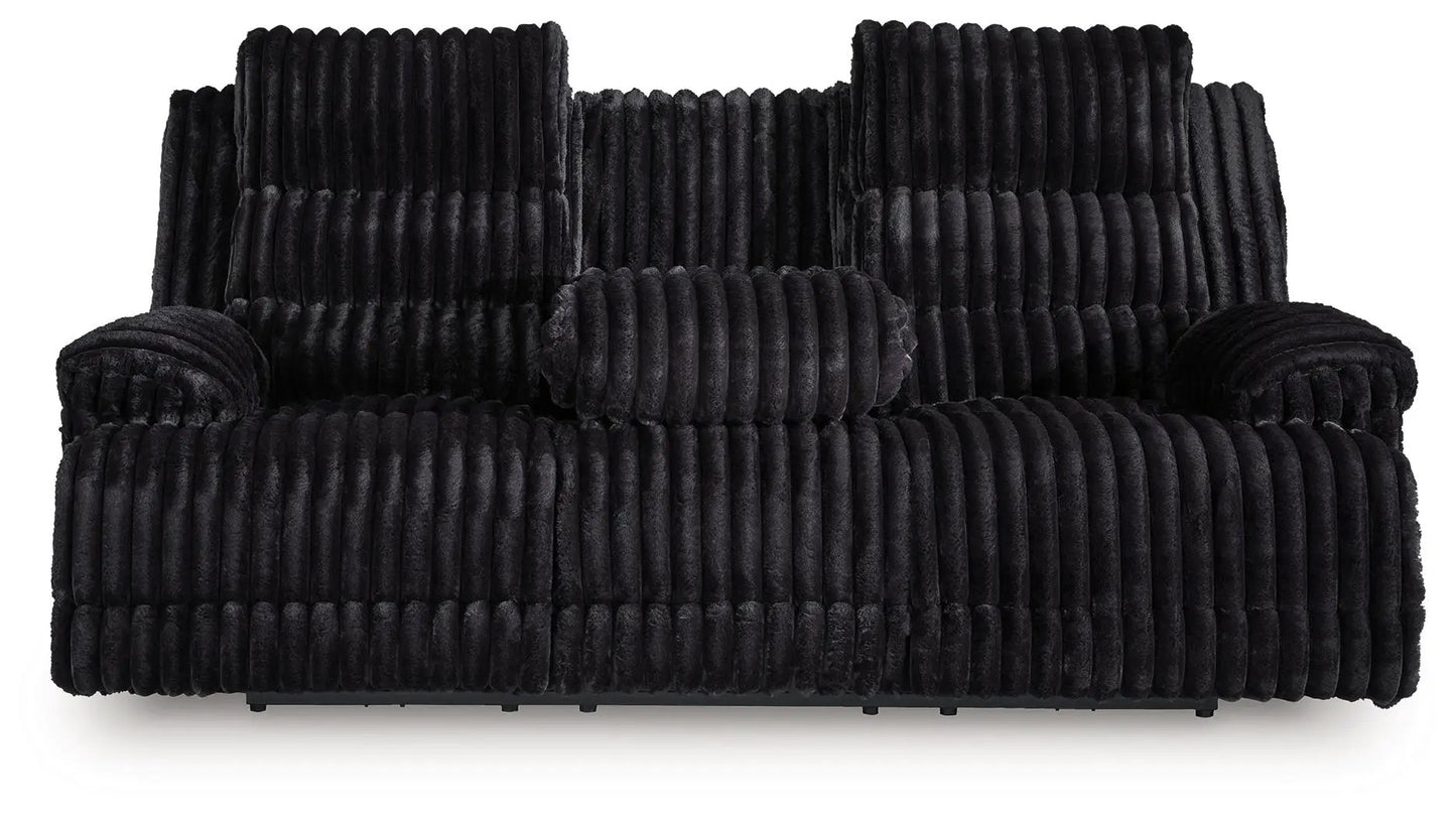 Rhine Falls Onyx reclining power sofa with black ribbed plush upholstery and bolster pillow on Tampa Home & Garden Store