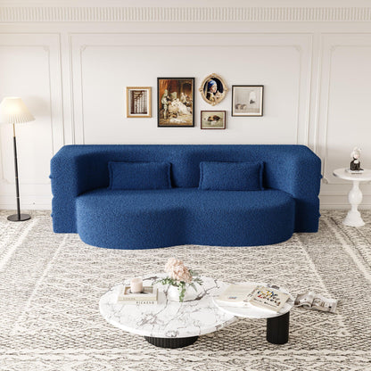 Futon sofa in blue teddy-fabric with two pillows, foam-filled convertible bed on Tampa Home & Garden Store