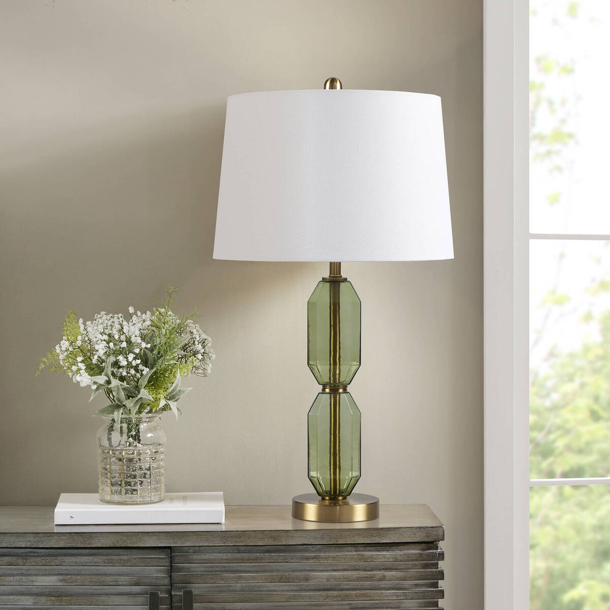 Faceted green glass table lamp with white shade and brass accents by HouseOfZazla on Tampa Home & Garden Store