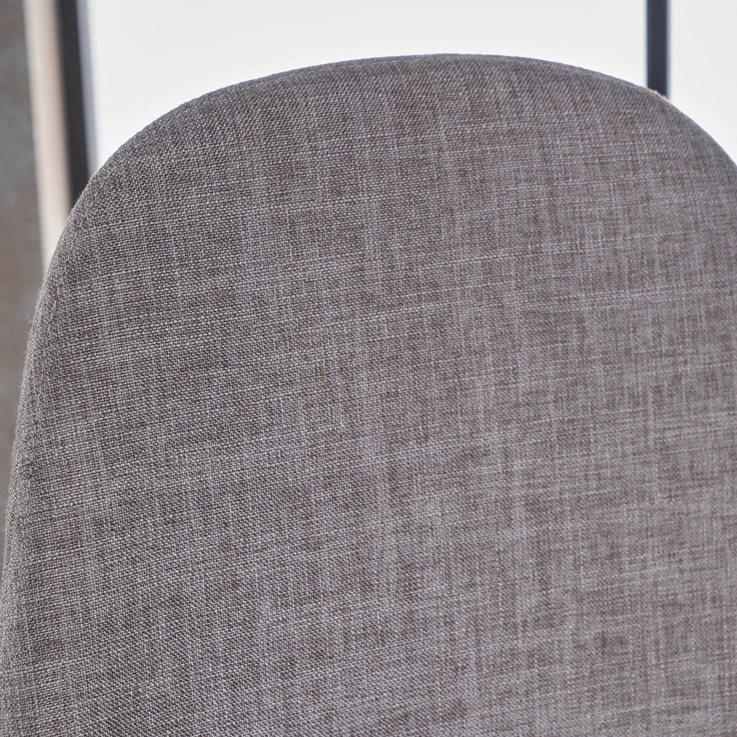 Modern minimalist fabric dining chair upholstery close-up in gray with textured weave on Tampa Home & Garden Store