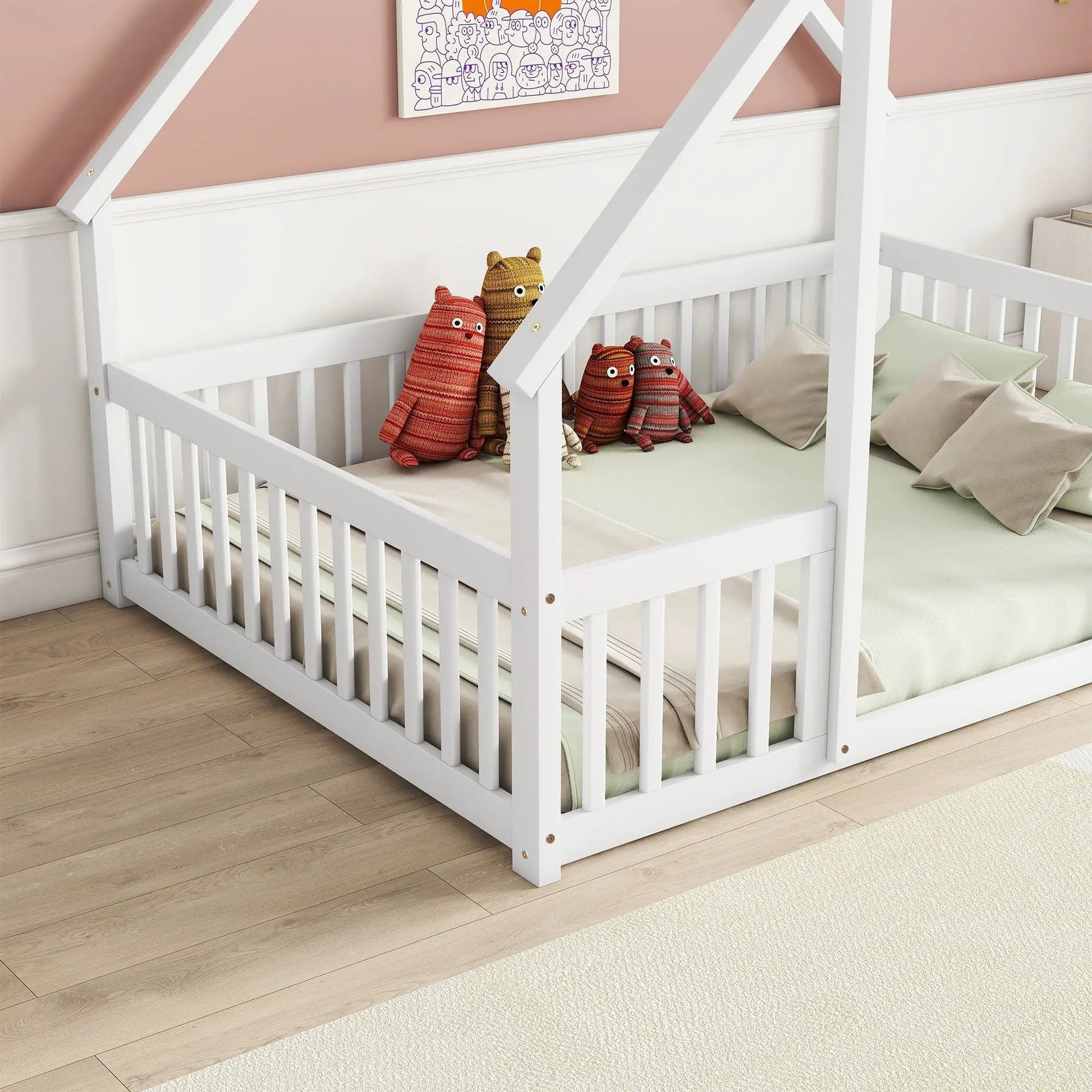 Wood house-shaped toddler bed with fence and guardrails, white frame, mint bedding, five plushes on Tampa Home & Garden Store