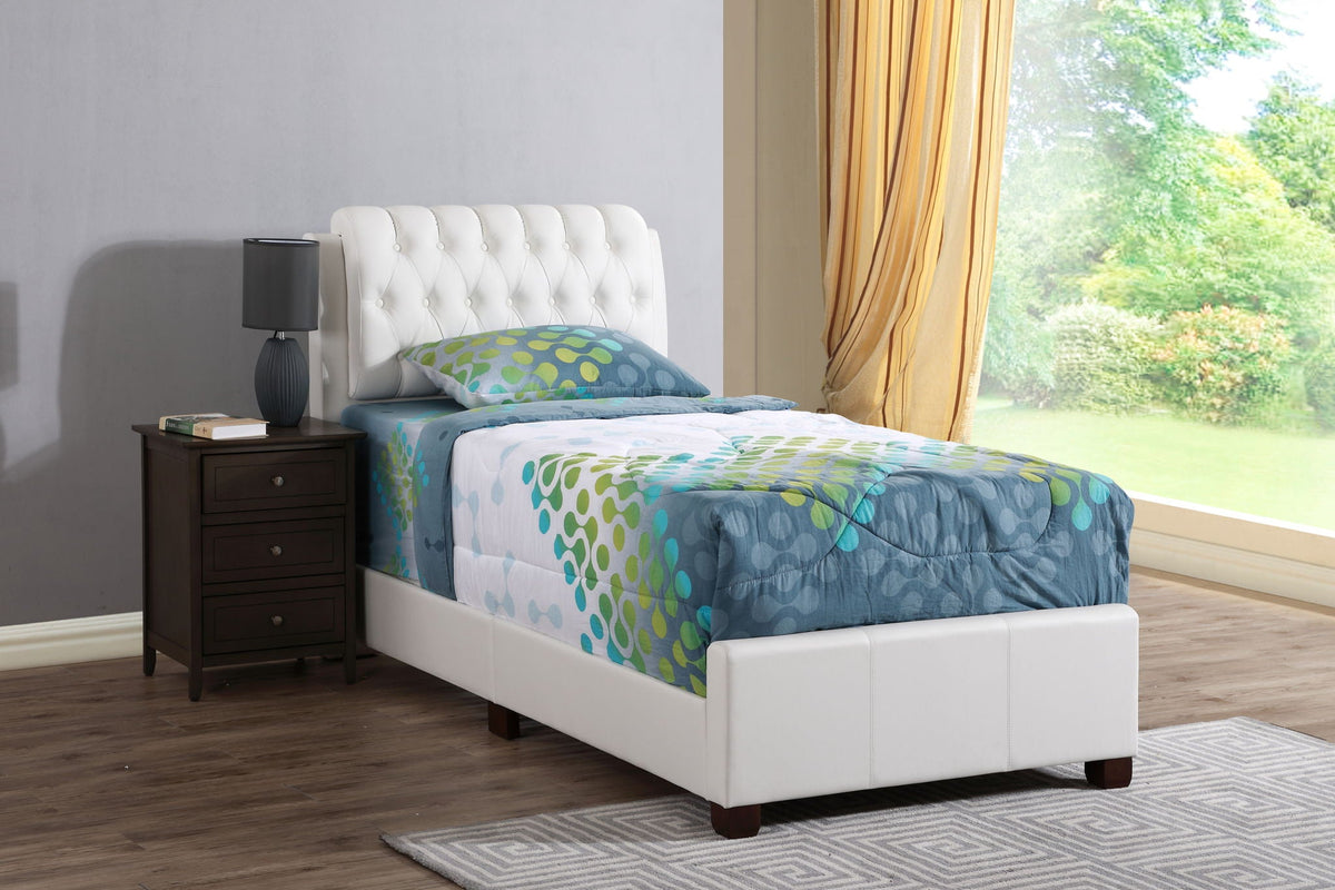 Tufted Upholstered Bed with white headboard and blue quilt by window on Tampa Home & Garden Store